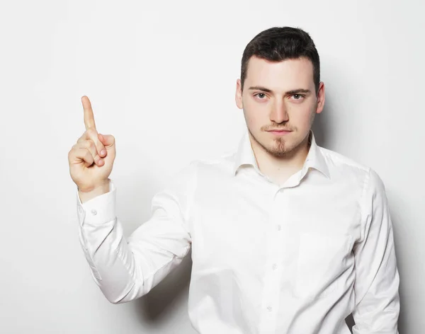 Business man pointing up finger over white — Stock Photo, Image