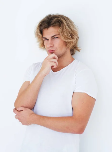 Young man, fashion model posing in a white t-shirt, casual style — Stock Photo, Image
