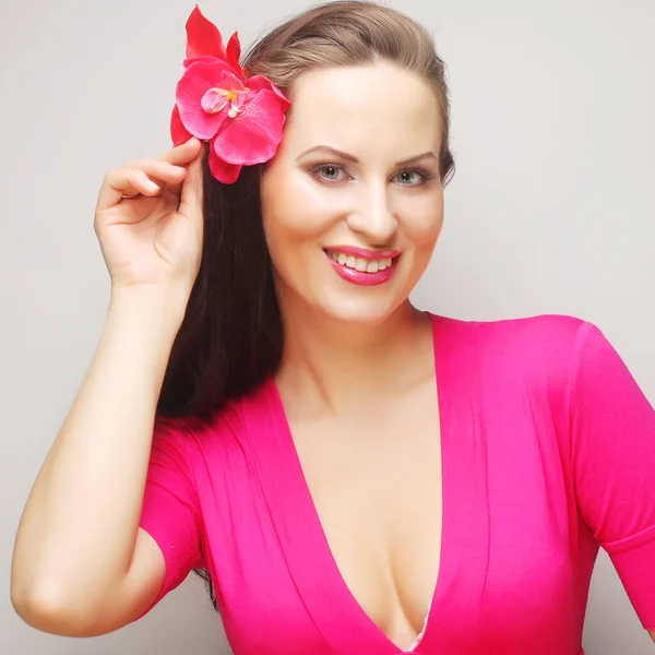 Brunette with long hair in pink wear happy smiling — Stock Photo, Image