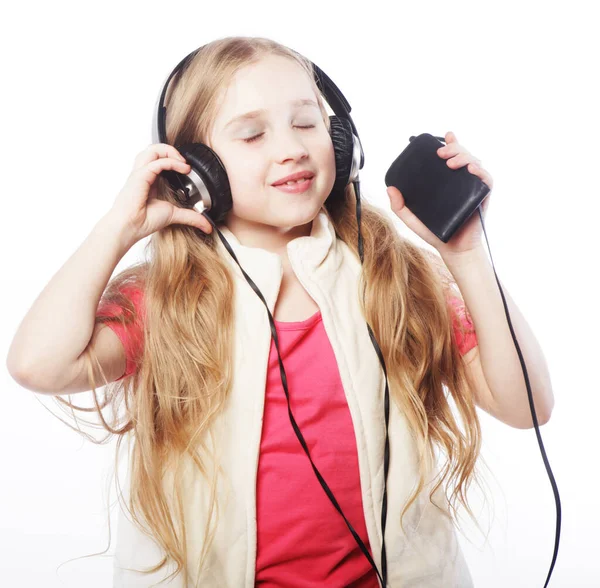 Bild eines glücklichen Mädchens mit großen Kopfhörern — Stockfoto