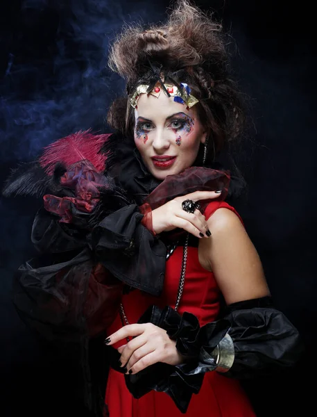 Mladá žena s kreativním make-upem. Halloween téma. — Stock fotografie