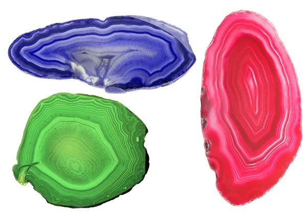 Три цветных агата, выделенных на белом — стоковое фото