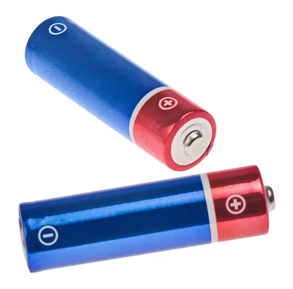 白に赤と青の二つの電池 — ストック写真