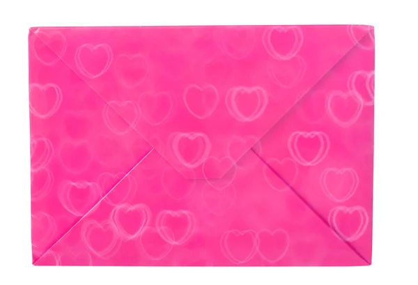 Różowa koperta w sercach na białym tle — Zdjęcie stockowe