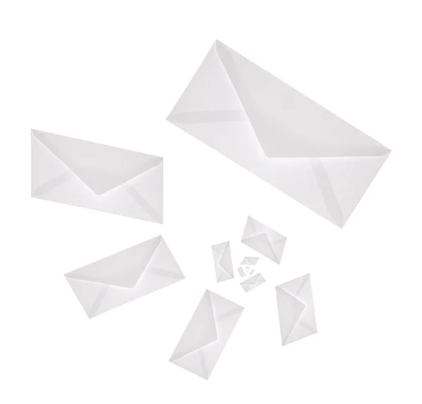 Groupe d'enveloppes volantes sur blanc — Photo