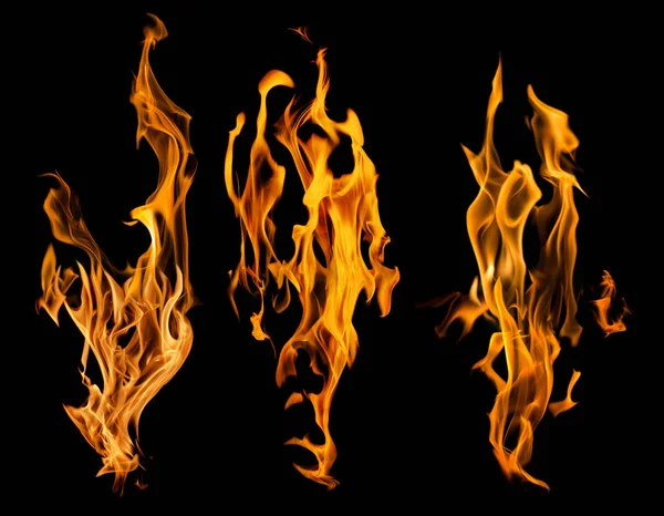 Set of orange fire sparks on black background — Stock Photo, Image