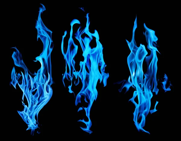 Set of blue fire sparks on black background — Stock Photo, Image