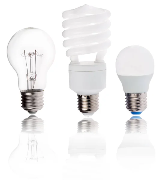 Três gerações de lâmpadas elétricas com reflexão — Fotografia de Stock