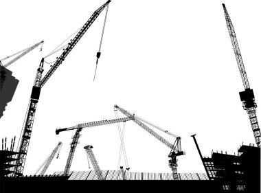 Siyah bina yakınında vinçler