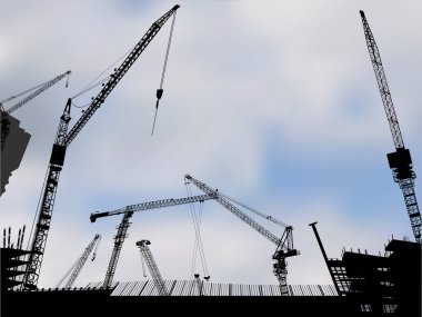 Gökyüzü arkaplanındaki binanın yakınındaki vinçler