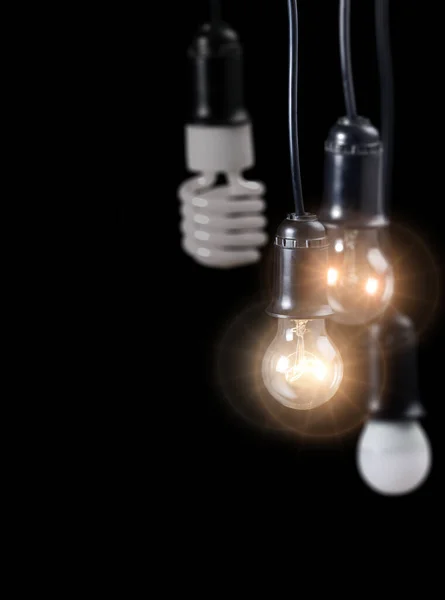 Группа Электрических Ламп Изолированных Черном Фоне — стоковое фото