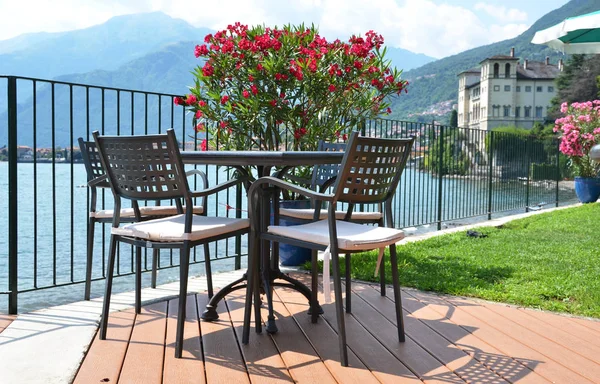 Table in a cafe against Como lake — Stock Photo, Image