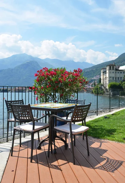 Table in a cafe against Como lake — Stock Photo, Image