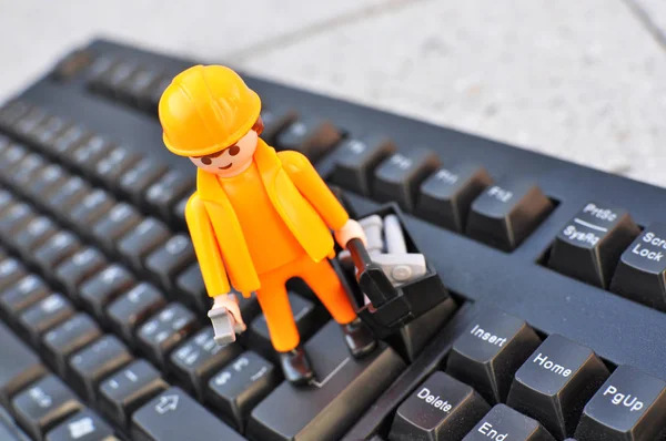 Little Toy Worker Keyboard — Stock Photo, Image