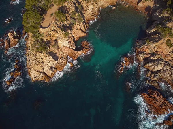 Drone footage over the Costa Brava coastal near the small town Palamos of Spain