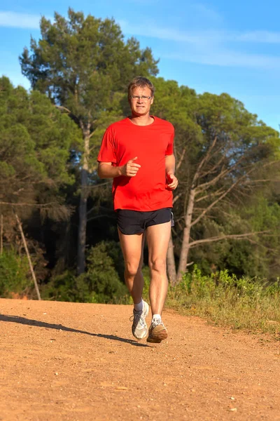 Young Man Running Forest Road Springtime — Stock Photo, Image