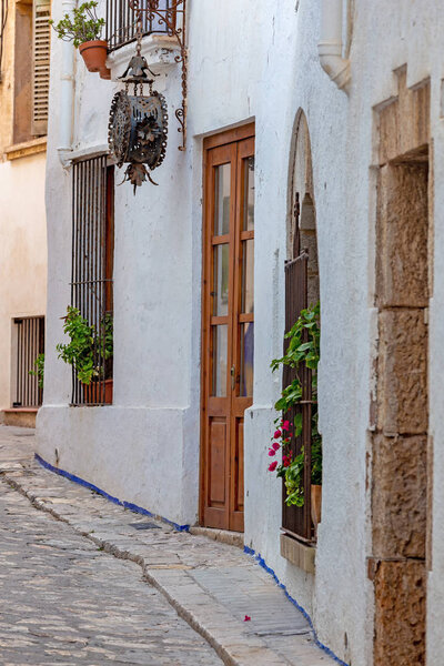 Typical street detail in small spanish village Sitges, province of Barcelona in Spain