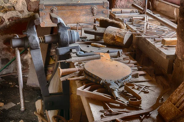 Tools on a Bench in an old Blacksmiths Shop