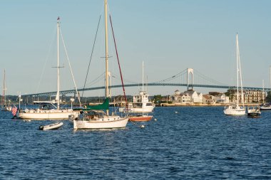 NEWPORT, RHODE ISLAND - SEPTEMBER 30, 2018: Boats moored in the bay of Newport, Rhode Island clipart