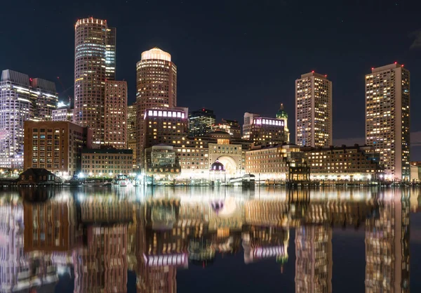 Reflection of the Boston City Skyline at Night from Fan Pier Park