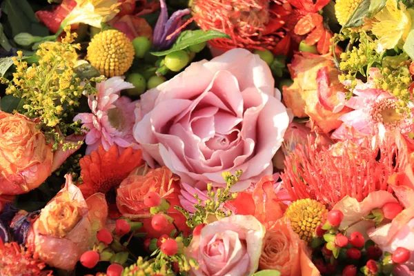 Bridal flowers in orange, yellow and pink — Stock Photo, Image