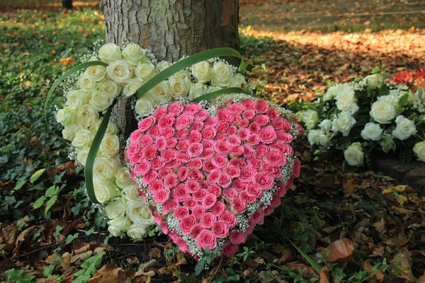 Heart shaped sympathy flowers