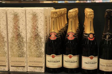 Beverwijk, the Netherlands, december 15th 2018: Champagne in a liquor store clipart