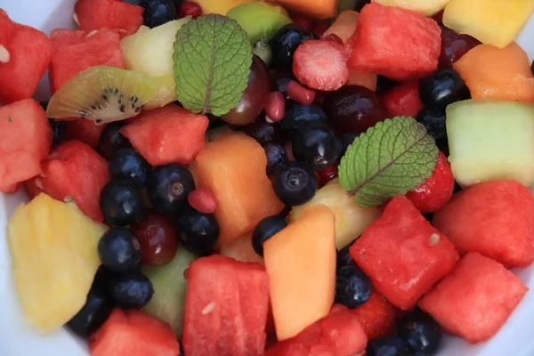 Fresh Juicy Fruit Salad Bright Colors Decorated Fresh Mint Leaves — Stock Photo, Image