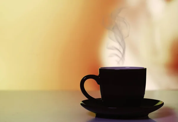 Eine Tasse Kaffee Auf Warmem Hintergrund — Stockfoto