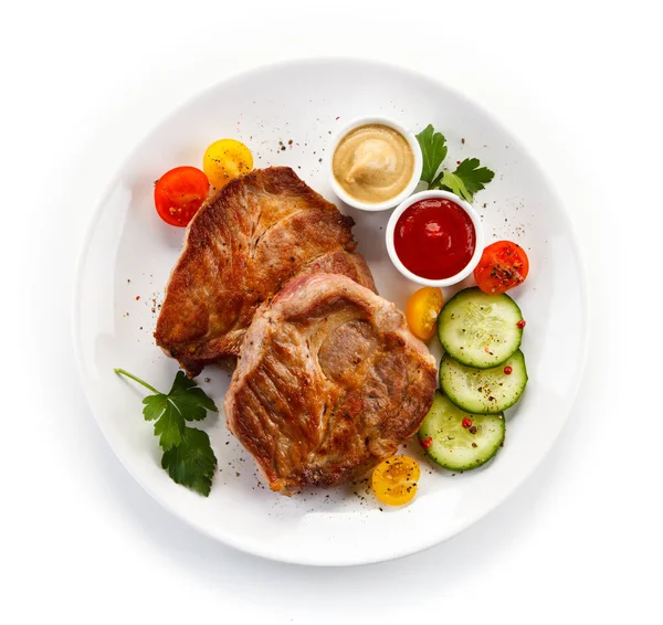 Top View Roasted Pork Steaks Sliced Cucumbers Cherry Tomatoes Mustard — Stock Photo, Image