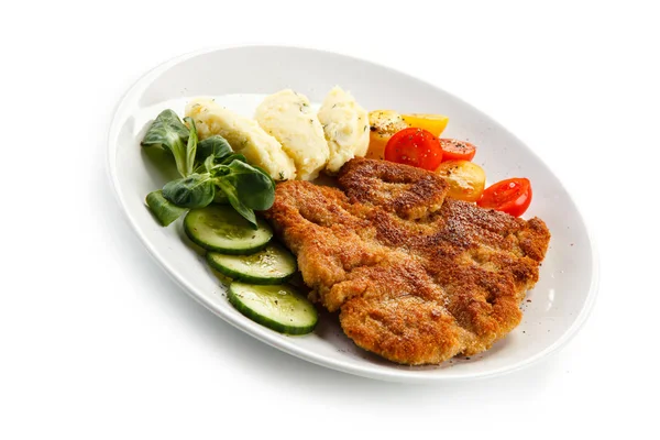 Pork Schnitzel Garnished Potato Dumplings Tomatoes Cucumbers Spinach Leaves White — Stock Photo, Image