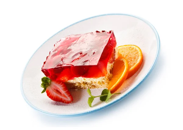 Piece Cake Jelly Strawberry Orange Slices White Plate Blue Edge Royalty Free Stock Photos