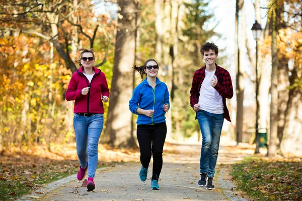 Happy Family Jogging Together Autumn Forest — Stock Photo, Image