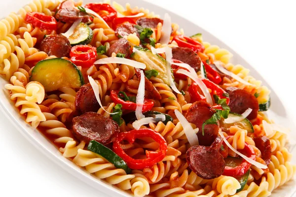 Detail View Spiral Macaroni Sausages Peppers Zucchinis Parmesan White Plate — Stock Photo, Image