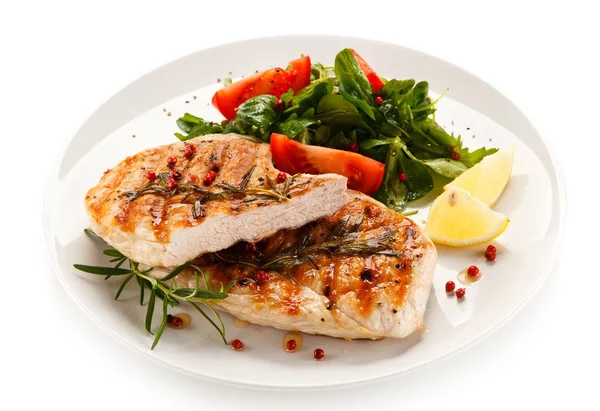 Grilled Chicken Breasts Fresh Cherry Tomatoes Spinach Lemon Slices White — Stock Photo, Image