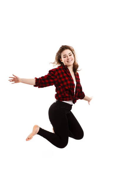 Menina Jeans Preto Camisa Quadriculada Pulando Isolado Fundo Branco — Fotografia de Stock