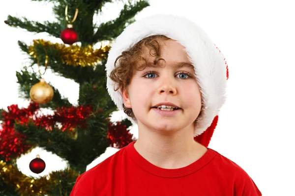 Chłopiec Santa Hat Stwarzających Jodły Białym Tle — Zdjęcie stockowe