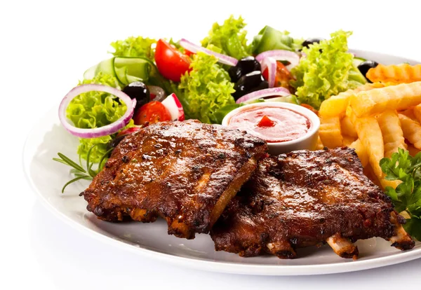 Roasted Pork Ribs Wavy French Fries Vegetable Salad Barbecue Sauce — Stock Photo, Image