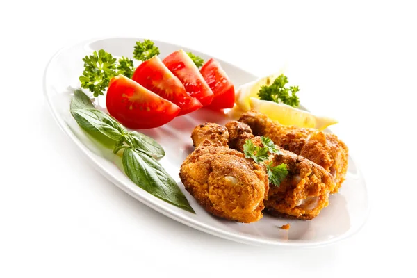 Deep Fried Chicken Legs Tomatoes Lemon Slices White Plate — Stock Photo, Image