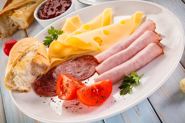White Platter Sliced Cheese Ham Sausages Cherry Tomatoes — Stock Photo, Image