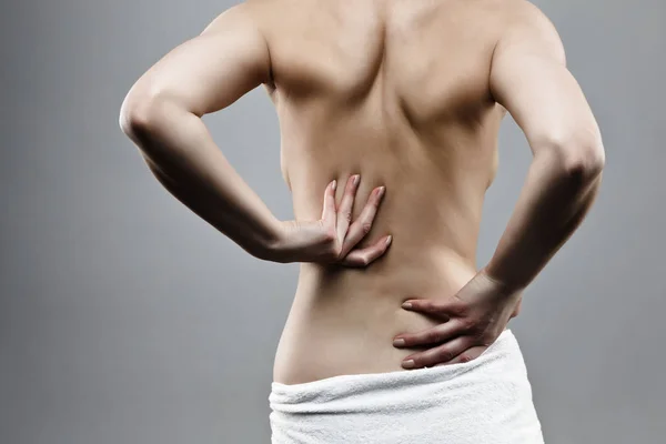 Mujer Masajeando Dolor Espalda —  Fotos de Stock