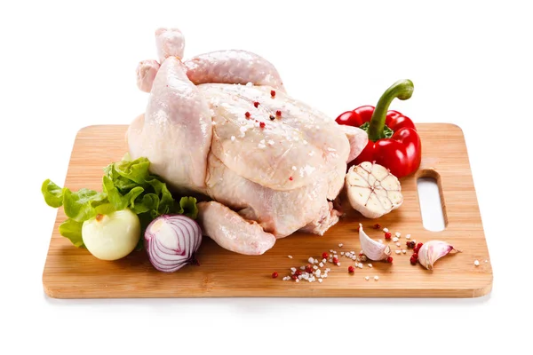 Whole Raw Chicken Bell Pepper Garlic Onions Lettuce Condiments Wooden — Stock Photo, Image