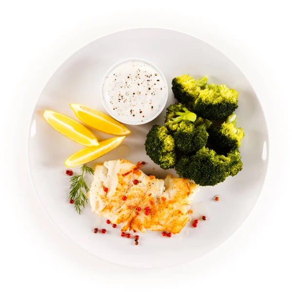 Broccoli Fried Fish Lemon Pieces Yoghurt White Plate — Stock Photo, Image