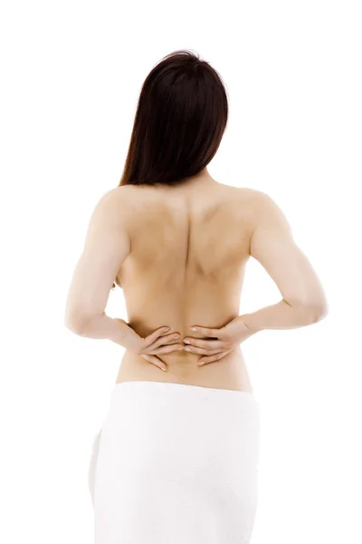 年轻的裸体妇女在腰间感到疼痛的后视 — 图库照片