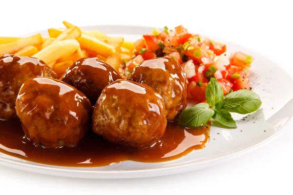 French Fries Meatballs Covered Tomato Sauce Served Plate Chopped Vegetables — Stock Photo, Image