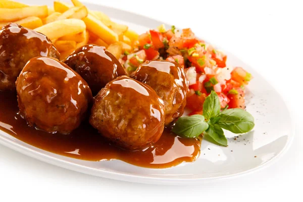 French Fries Meatballs Covered Tomato Sauce Served Plate Chopped Vegetables — Stock Photo, Image