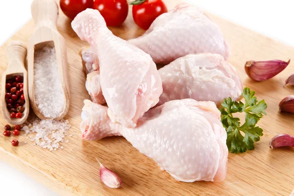 Raw Chicken Legs Cherry Tomatoes Garlic Salt Pepper Wooden Board — Stock Photo, Image