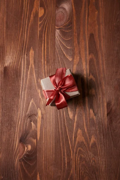 craft gift box on wooden table, close-up