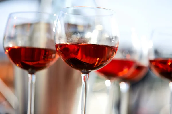 glasses of rose wine in bright sunlight, close-up