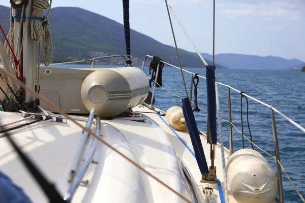 yacht floating in sea at sunny day